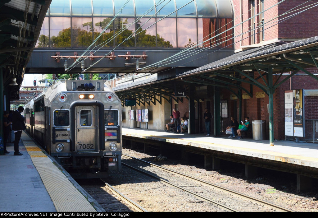 Passengers Waiting for Their Trains